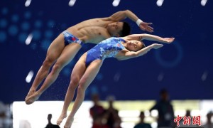 世锦赛：中国跳水日入两金 李冰洁400米自由泳摘银