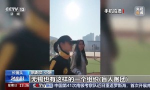 手拉手“追光” 无锡首位视障教师圆梦马拉松